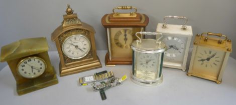Six clocks including one onyx, four carriage clocks, and two wristwatches by Quernex