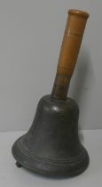 A large bronze hand bell