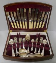 Two wooden cased canteens of cutlery, Ernest Cockbill and James Dixon & Sons, Sheffield