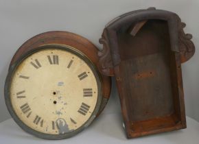 A 19th Century drop dial wall clock case with dial, bezel and assorted clock weights