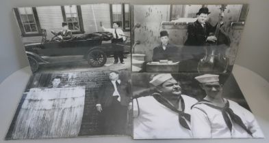 Fourteen black and white Laurel & Hardy prints