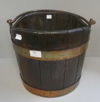 A Victorian brass bound bucket