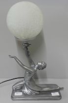 A modern Art Deco style figural table lamp