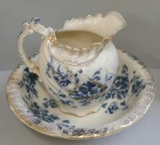 A Staffordshire blue and white wash jug and bowl