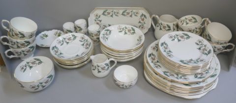 A Crown Staffordshire tea and dinner service, six/seven setting, 49 pieces