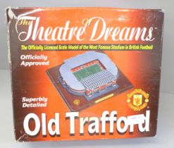 A Theatre of Dreams scale model of Old Trafford, boxed