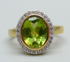 A 925 silver gilt, peridot and zircon ring, M/N