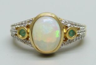 A silver gilt Welo opal, emerald and zircon ring, M