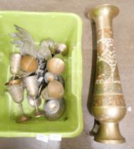 A Middle Eastern large brass vase, six brass goblets, a pair of silver plated candlesticks, etc. **