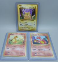 Three Japanese first edition Pokemon cards, Pikachu, Charmander and Charmeleon