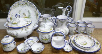 A collection of French hand painted china; tureen, large dish, goblets, dishes, etc., Le Renoleau,