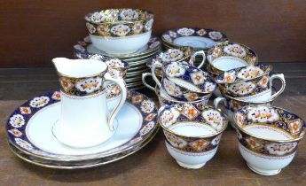 A Royal Albert twelve setting tea service, with sugar bowl, cream jug and two sandwich plates