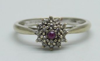 A 9ct gold, ruby and diamond cluster ring, 1.7g, P