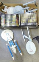 A collection of Star Trek DVDs (full set) and four models of USS Enterprise