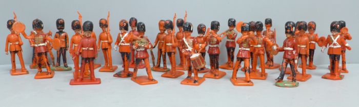 A collection of toy soldiers, marked Lone Star, Crescent Toys and Kellogg's