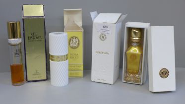 A bottle of Dolce Vita perfume, Nina Ricci L'Air du Temps eau de toilette and White Diamonds