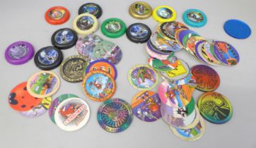 A collection of Pogs and Lego Technic throwing disks