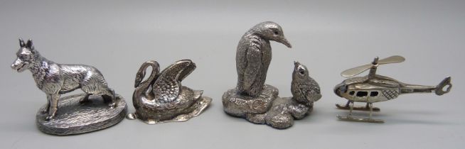 Two sterling silver covered models of animals, a Victorian hallmarked silver model of a swan,