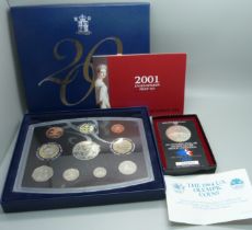 A 1984 Olympics USA silver dollar proof quality and a 2001 United Kingdom proof set 'Glimpses of the