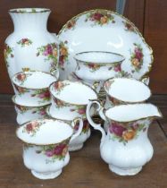 Royal Albert Old Country Roses; seven cups and saucers, five tea plates, bread and butter plate,