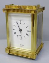 A brass and four glass sided carriage clock, St. James, London