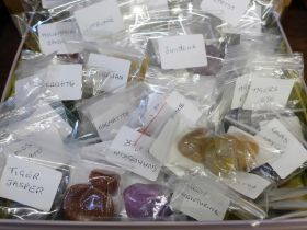 A collection of mineral samples; amethyst, amazonite, citrine, smoky quartz, kyanite, etc., and a