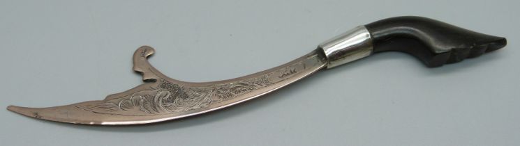 An Eastern letter opener with carved horn handle, 13cm