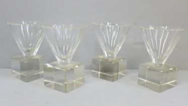 Four heavy crystal glass liqueur glasses, signatures worn and each base chipped