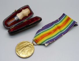 A WWI Victory medal to 5282 Pte. E. Reid Y. & L. R., and a cased cheroot holder