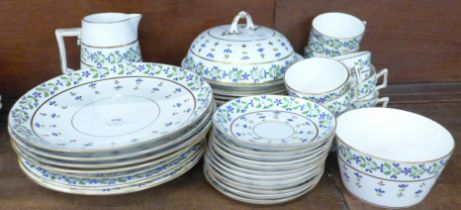 An Edwardian part tea set, with muffin dish, retailed by Mortlocks, Oxford Street, 43 pieces, some