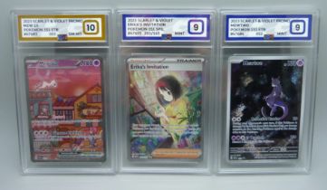 Three graded scarlet and violet Pokemon cards, graded 10 and 9 including Mew and Mewturo