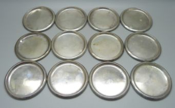 A set of twelve Norwegian silver dishes, marked 830, 183g, 7cm