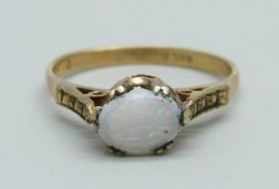 A 9ct gold and opal solitaire ring, 1.7g, M/N