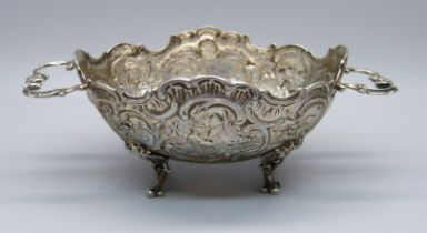 An embossed two handle German 800 silver dish, 108g