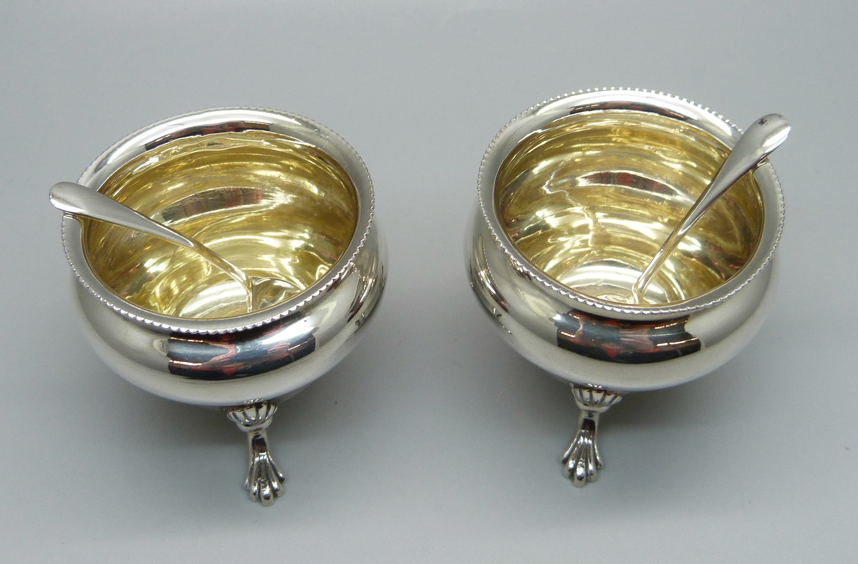 A pair of silver salts and a pair of silver salt spoons, 65g - Image 2 of 4