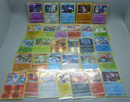 Thirty holo/reverse holo Pokemon cards