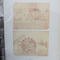A folio of Leonardo da Vinci prints of drawings and designs