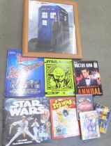 A Dr. Who print, other Dr. Who items, Thunderbirds book, Star Wars record, etc.