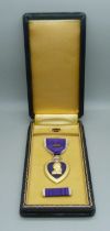 A Purple Heart For Military Merit medal, boxed