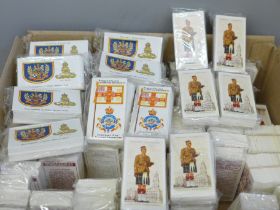 A box of 81 John Players complete sealed reproduction cigarette card sets, 25 full sets of Badges