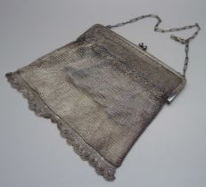 An Art Deco silver mesh purse, Birmingham import mark for 1923, with original receipt dated 1924,