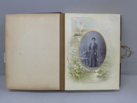 A Victorian/Edwardian photograph album containing carte de visite and cabinet cards (47), album a/f