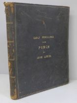 A leather bound volume, Early Pencilllings from Punch, by John Leech, 1864