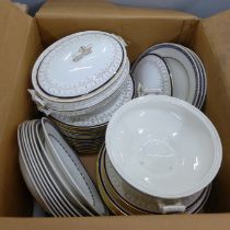 A Royal Crown Derby part dinner service, plates and soup bowls, two medium oval tureens, 36 pieces