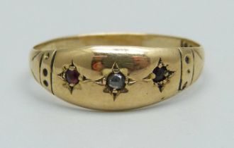 A c1900 yellow metal, diamond and garnet ring, 1.7g, O