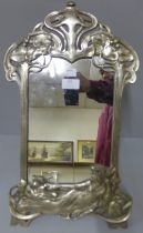 An Art Nouveau style white metal strut mirror