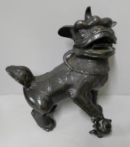 A bronze Dog of Foe