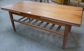 A Danish teak extending coffee table