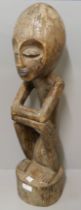 A tribal carved figure