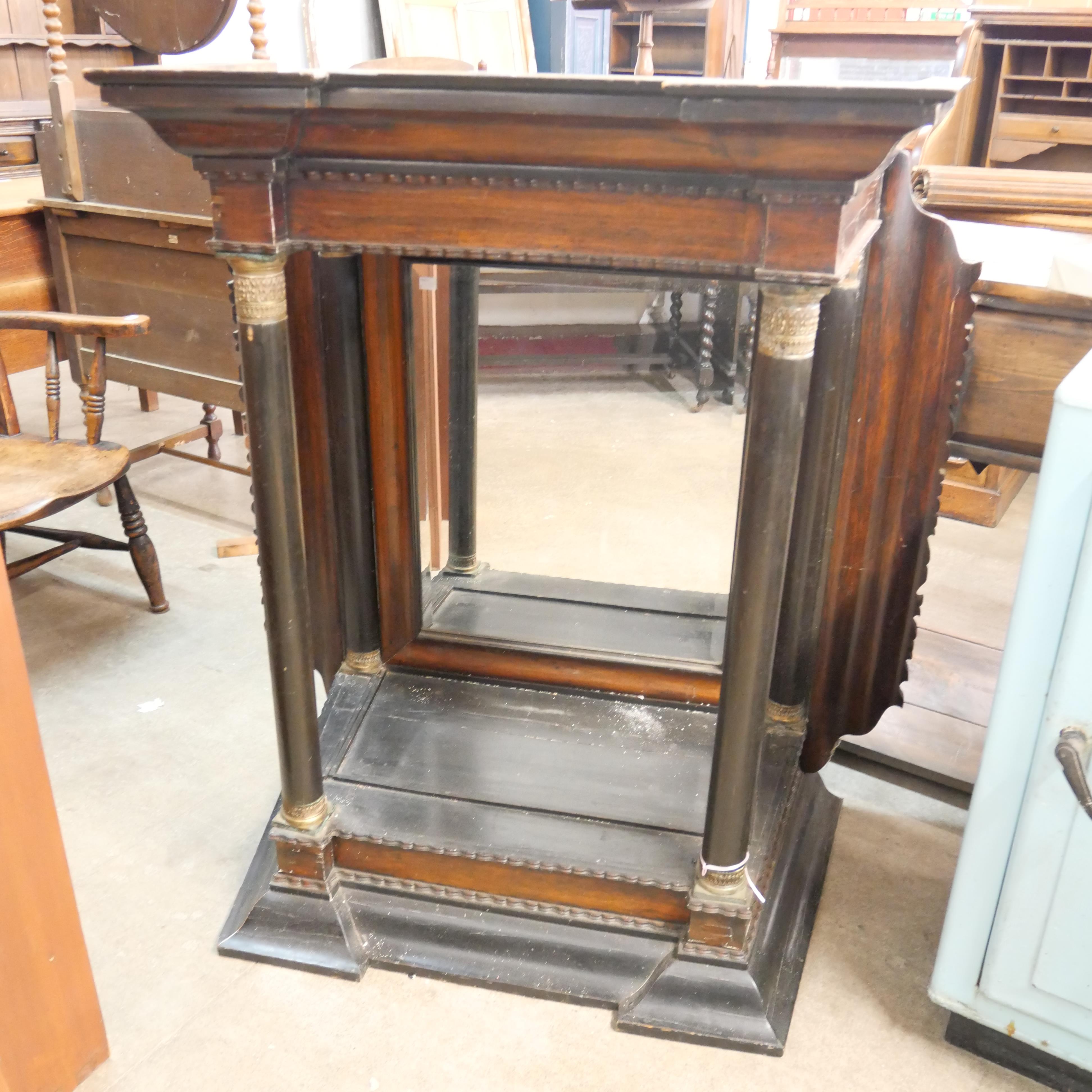 A Victorian oak and ebonised mirrorback console table